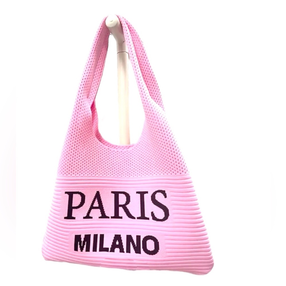 Pink Knit Sturdy Handbag with Paris Milano Knitted within the fabric.